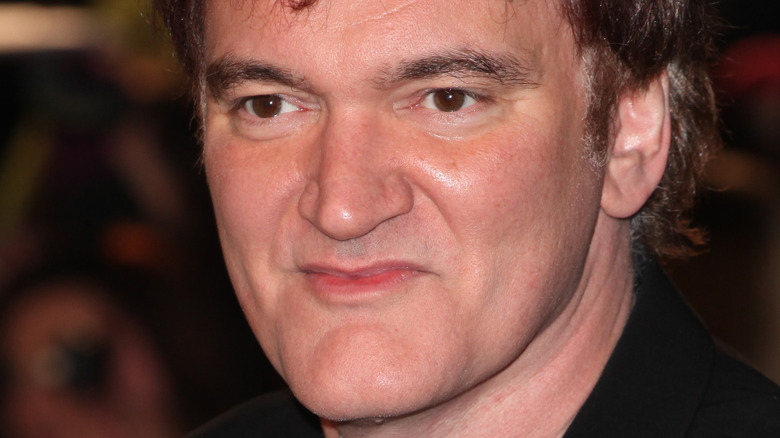 Quentin Tarantino smirking