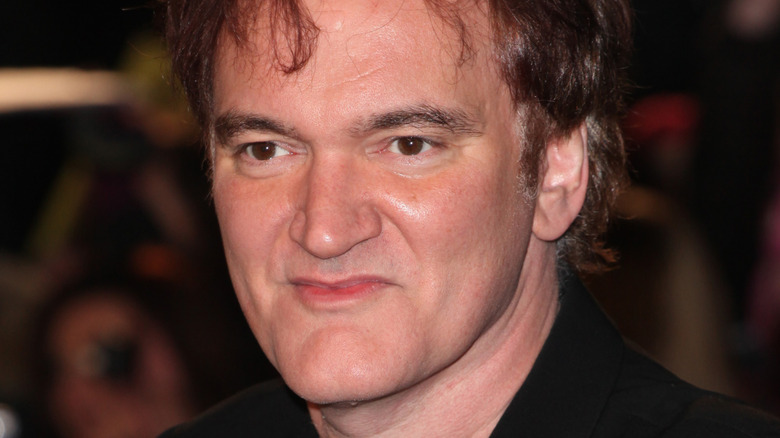 Quentin Tarantino smirking