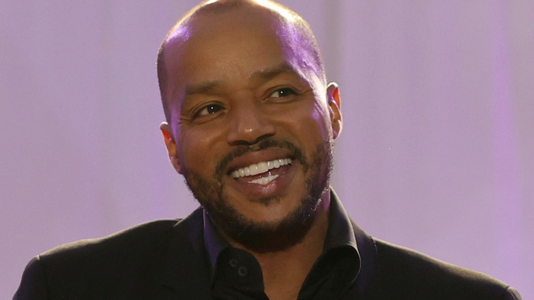 Donald Faison looking happy