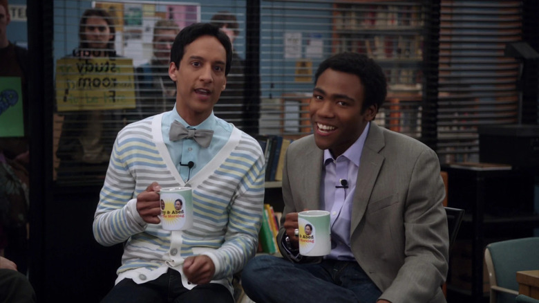 Troy and Abed sitting in library 