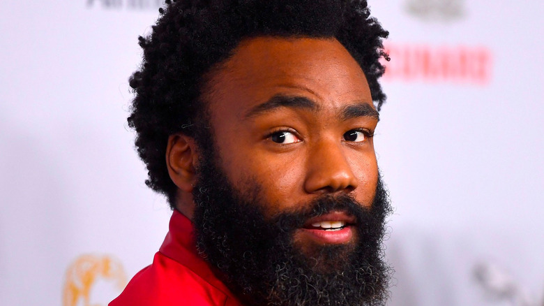 Donald Glover turning smiling