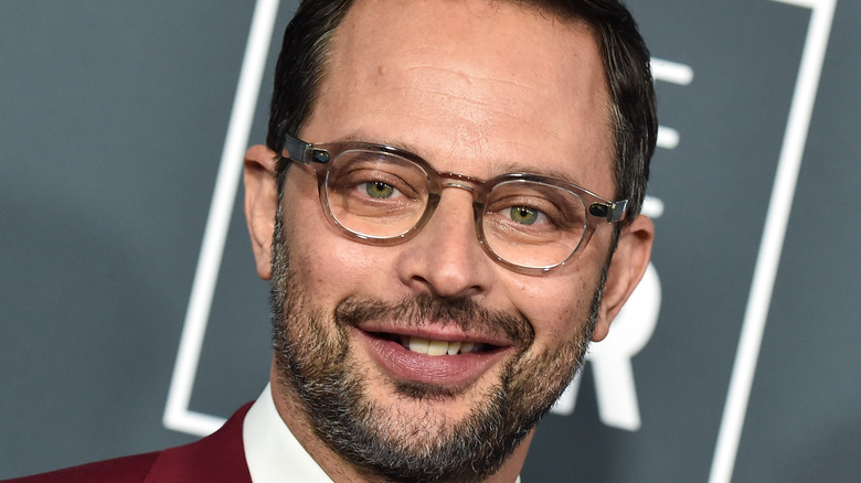 Nick Kroll smiling into camera