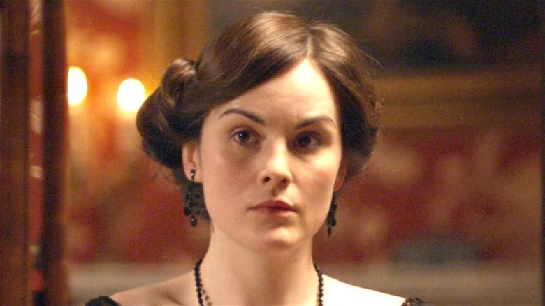 Michelle Dockery as Mary listening on Downton Abbey