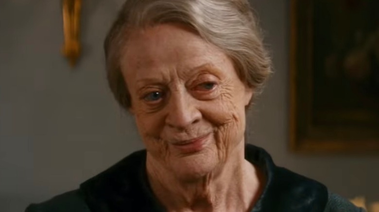 Maggie Smith grinning in Downton Abbey 