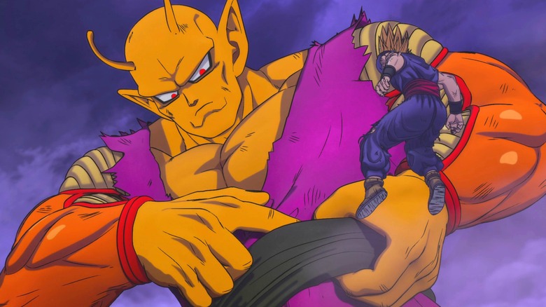 Orange Piccolo looks down at Goku