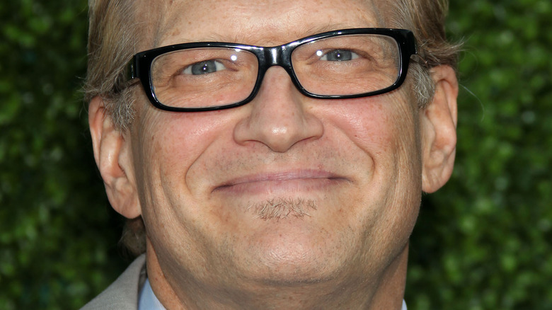 Drew Carey microphone in front of Plinko