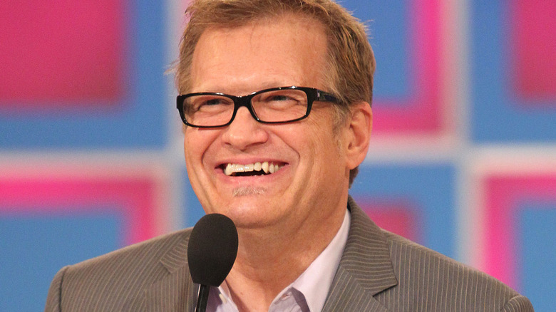 Drew Carey winking