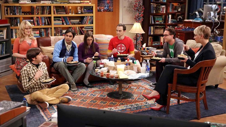 Howard Bernadette Raj Amy Sheldon Leonard and Penny eating in the living room on The Big Bang Theory