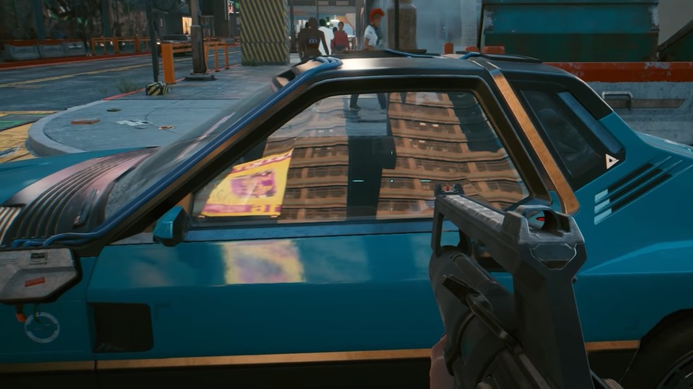 V pointing gun