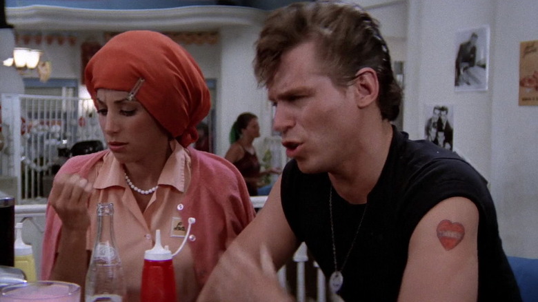 Kenickie and Frenchy at table