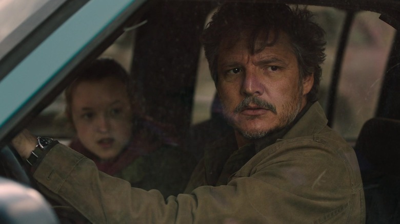 Joel and Ellie looking out of car window in "The Last of Us"
