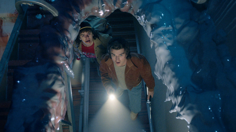 Dustin and Steve looking up in shock in Stranger Things 5