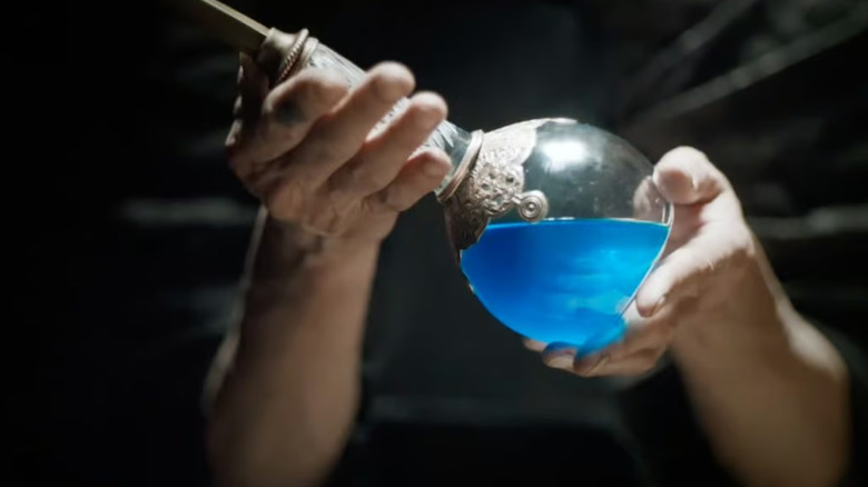 A bottle holding the blue Water of Life in Dune: Part Two