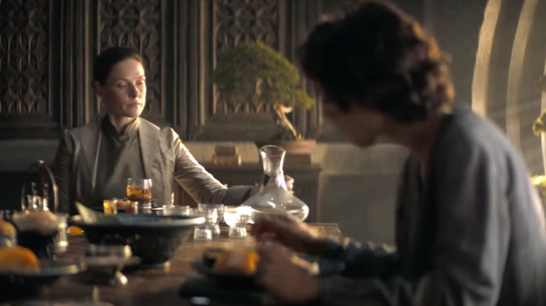 Jessica and Paul talking at a meal in Dune: Part One