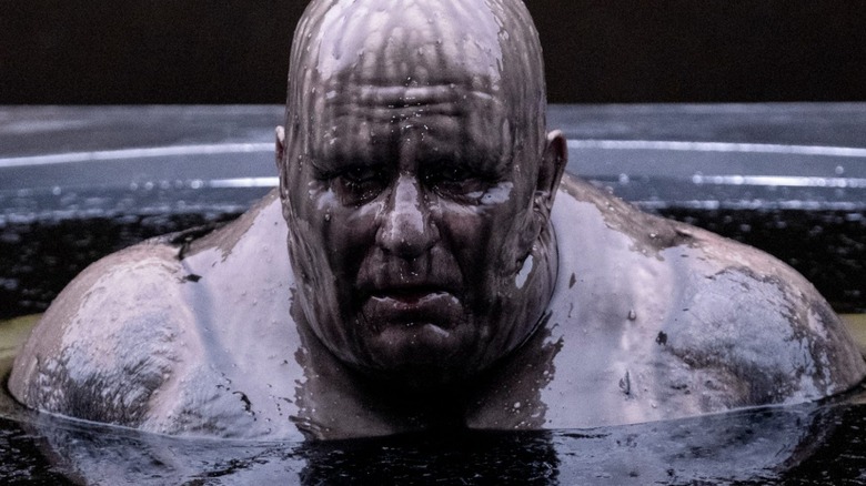 Baron Vladimir Harkonnen bathing dark liquid