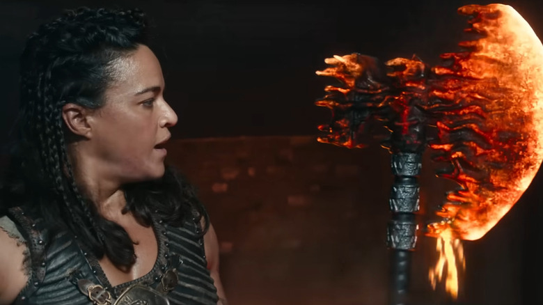 Michelle Rodriguez holds ax