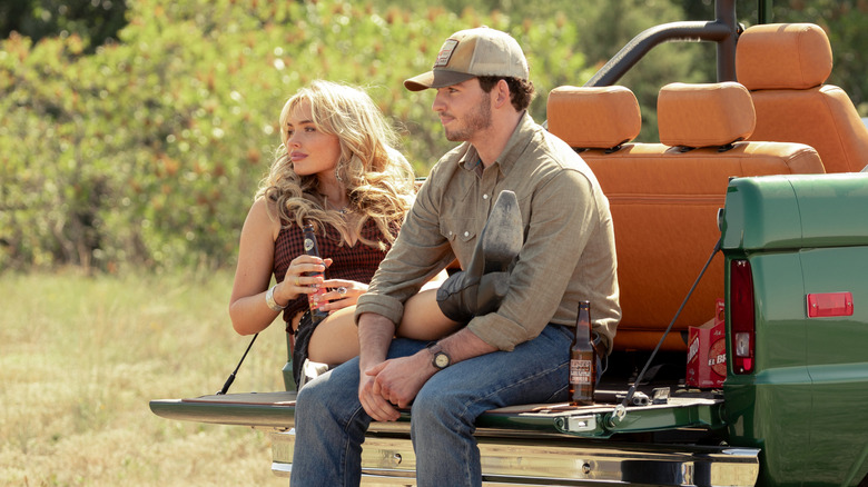 Oreana and Carter hang out on a trailer hitch in "Dutton Ranch"