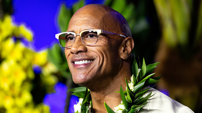 Dwayne Johnson wearing white glasses