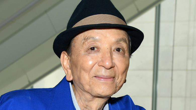 James Hong wearing a blue suit