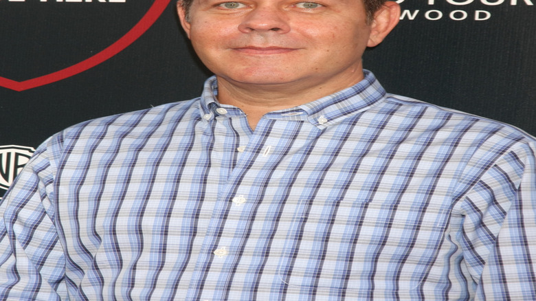 James Michael Tyler smiles