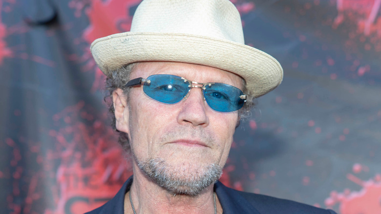 Michael Rooker in blue sunglasses