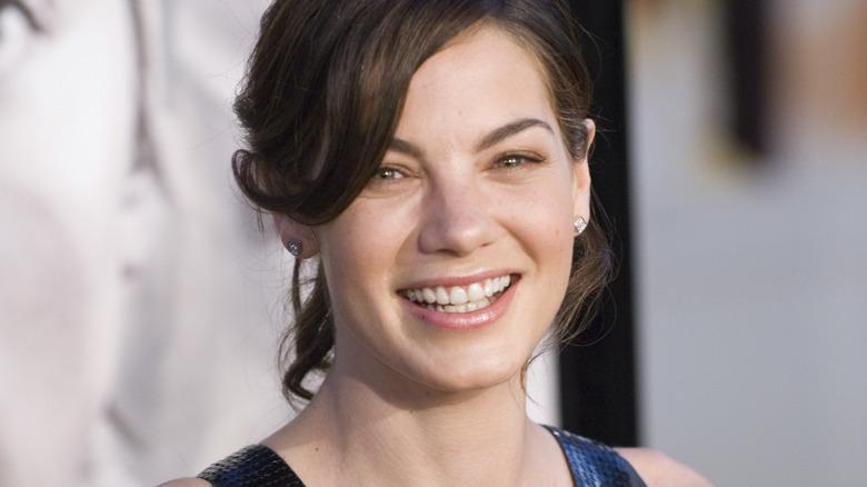 Monaghan smiling at premiere