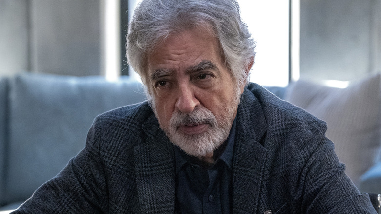 Joe Mantegna leans forward