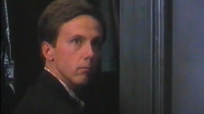 Harry Anderson looks over his shoulder