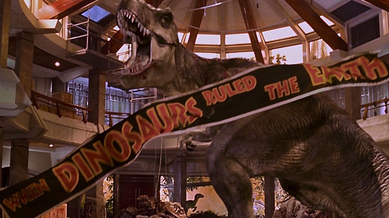 A T. rex stands and roars