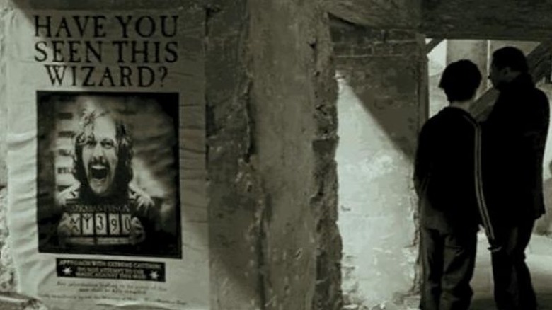 Wanted poster behind Arthur and Harry