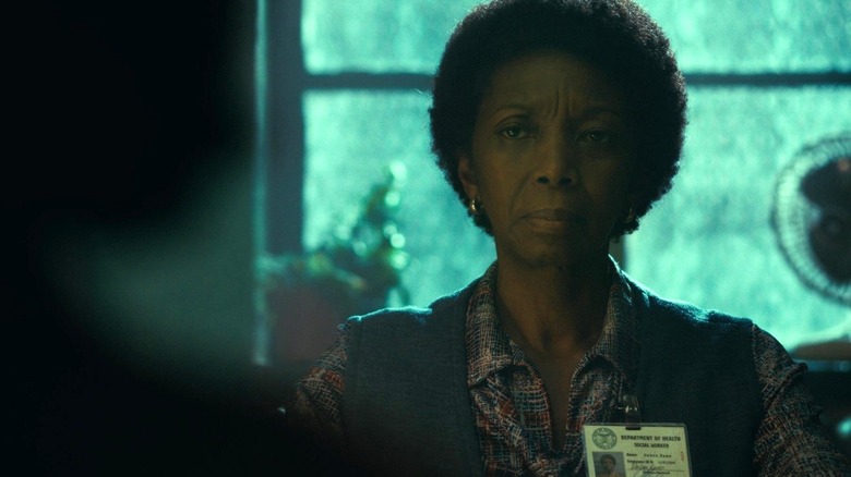 Debra Kane looking at Arthur Fleck in "Joker" (2019)