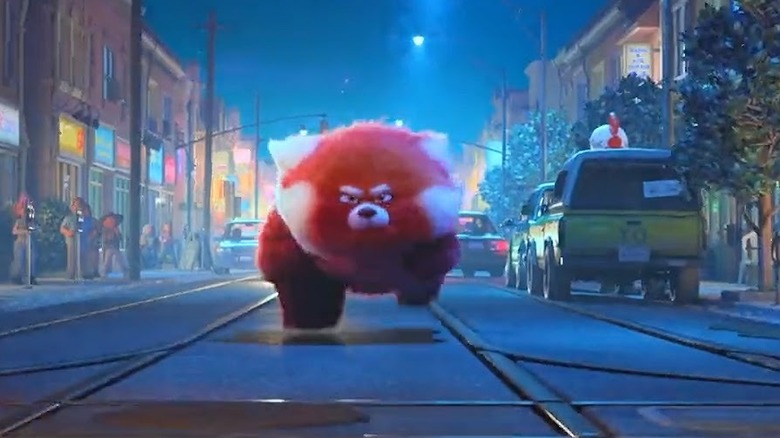 Mei passes the Pizza Planet truck