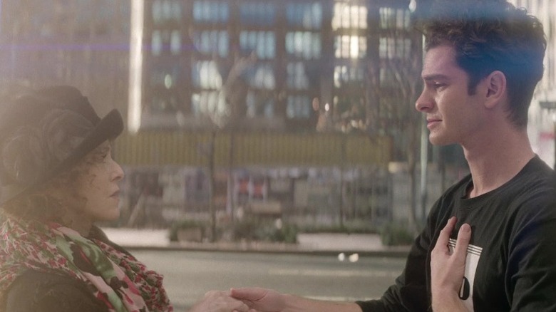 Jonathan Larson holding hands with Bernadette Peters
