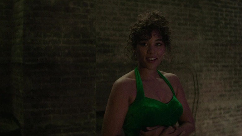 Susan wearing a green dress