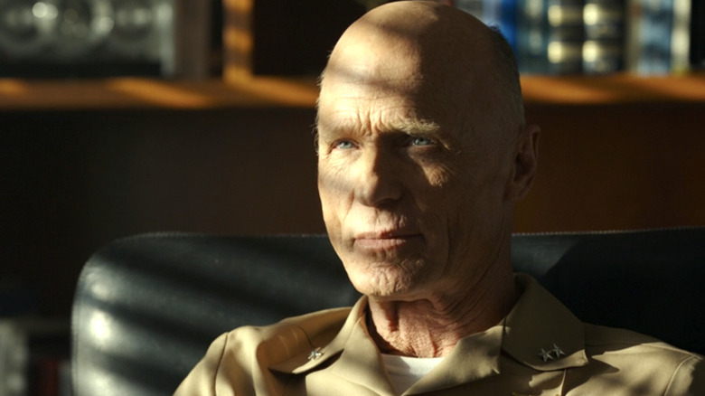 Ed Harris wears a Navy uniform