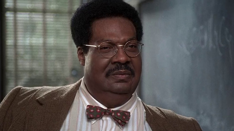 Professor Sherman Klump by chalkboard