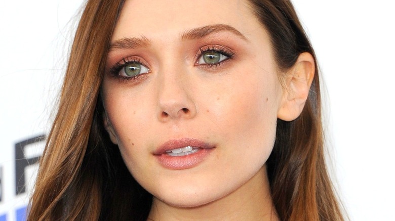 Elizabeth Olsen looking off camera