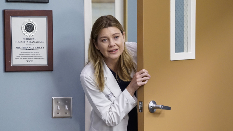 Meredith leaning past door
