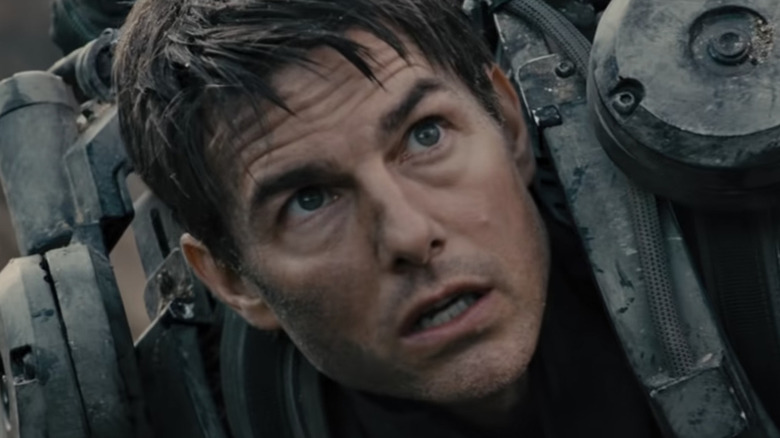 Tom Cruise as Cage looking shocked