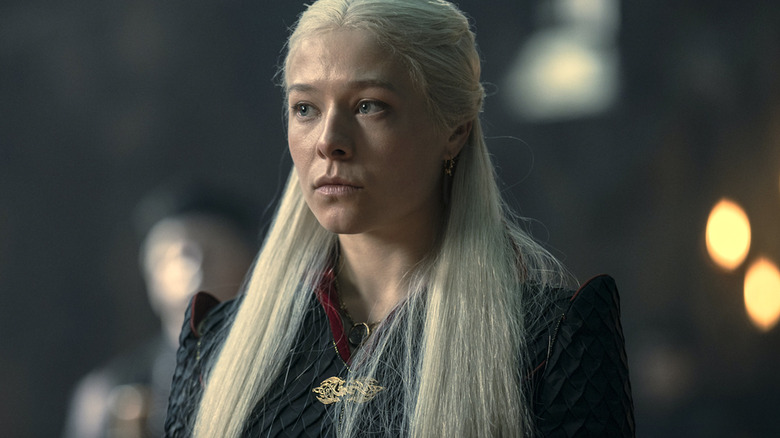 Rhaenyra Targaryen wears a black dragon-scale dress