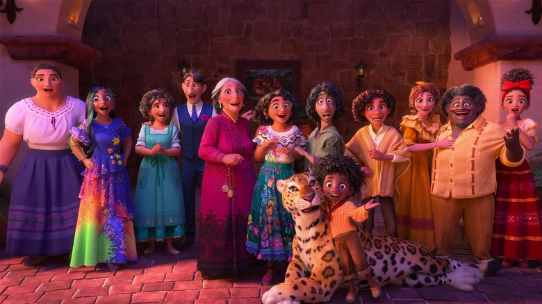 The Madrigals posing together and smiling