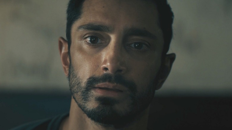 Riz Ahmed looks into distance