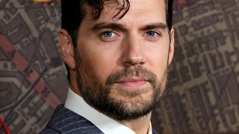 Henry Cavill looks at camera