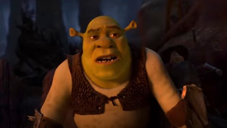 Shrek in a vest