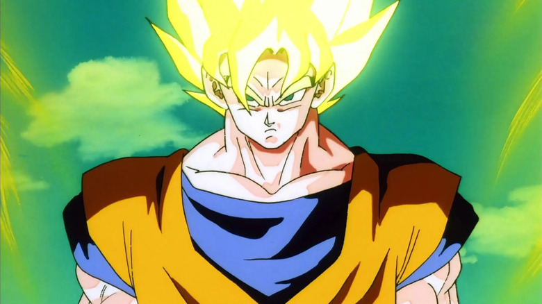 Goku stands with an angry face in his blonde hair Saiyan state in Dragon Ball Z.