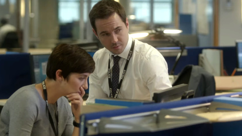 Kate Fleming and Steve Arnott sitting in the office in Line of Duty