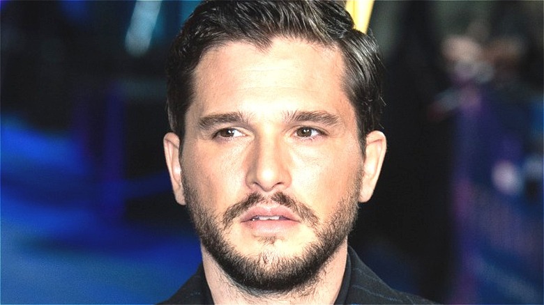 Kit Harington slicked hair staring