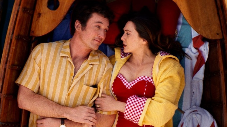 Larry and Joan laying in boat together