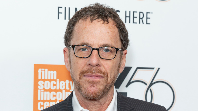 Ethan Coen posing on red carpet