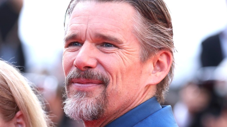 Ethan Hawke smiling for cameras